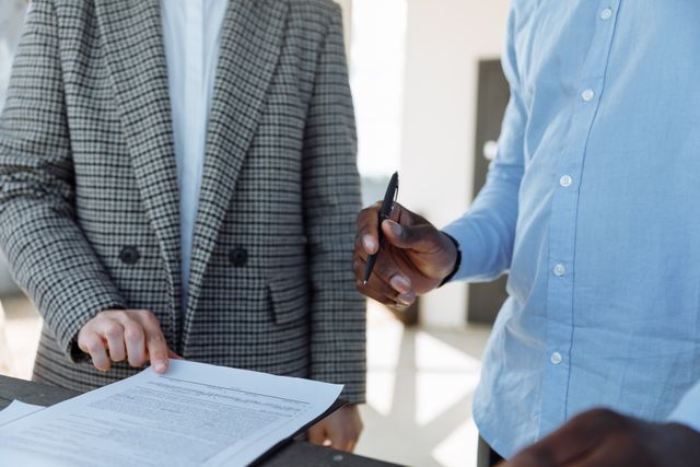 two people reviewing a form